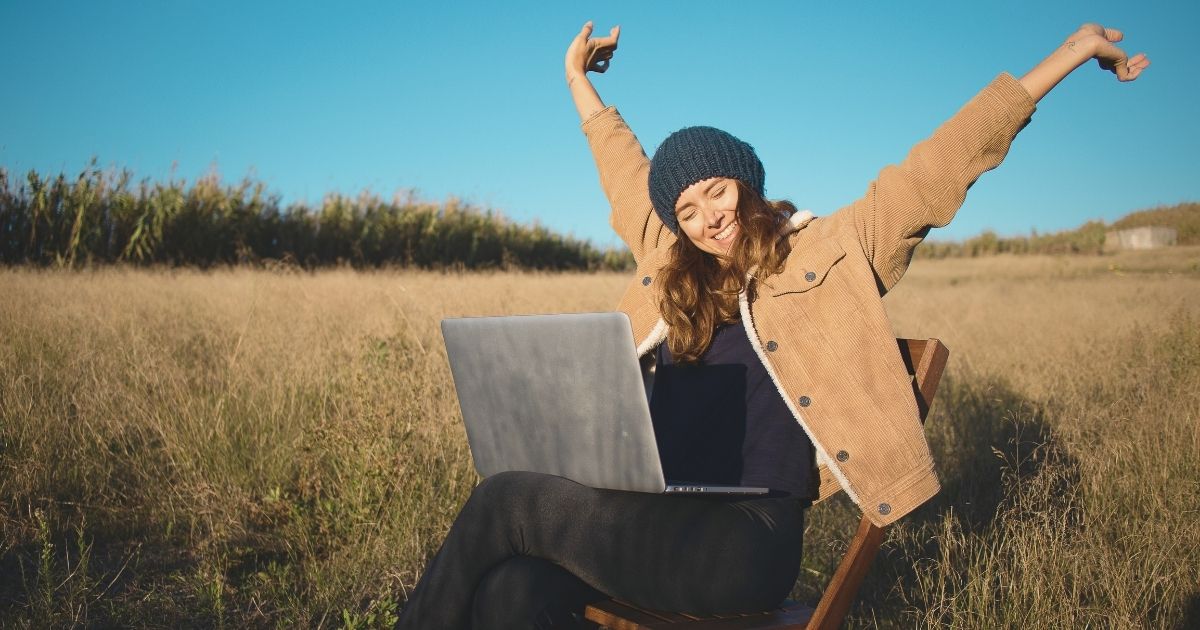 digital nomad woman working from anywhere