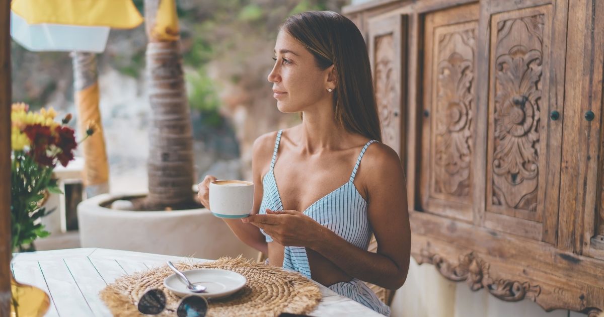 young woman enjoying her time in one of the best accommodation for digital nomads