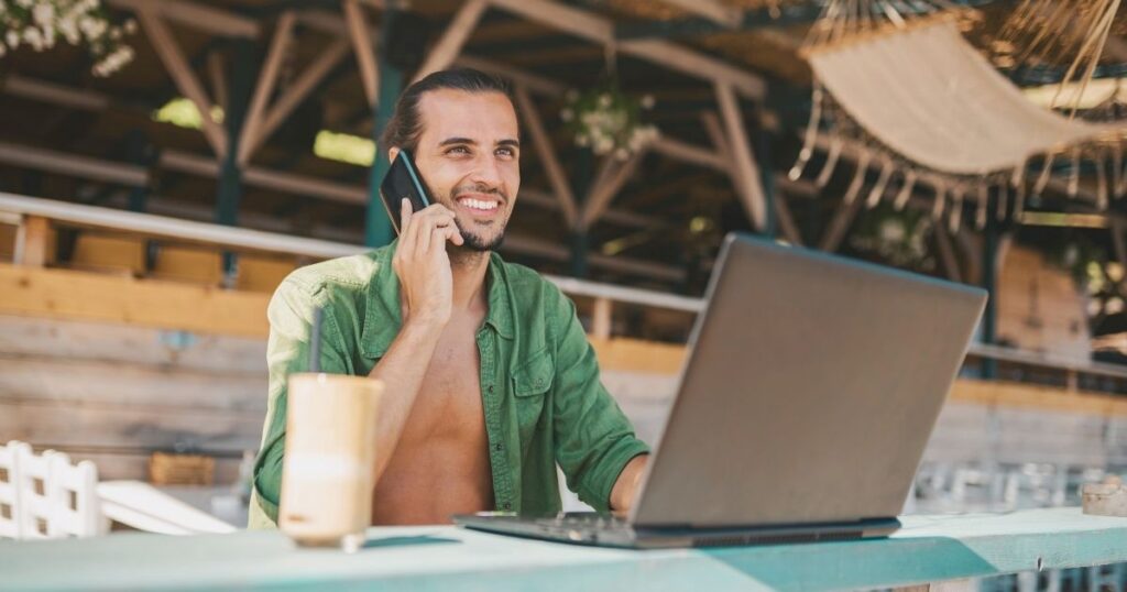 digital nomad man using wifi in his laptop