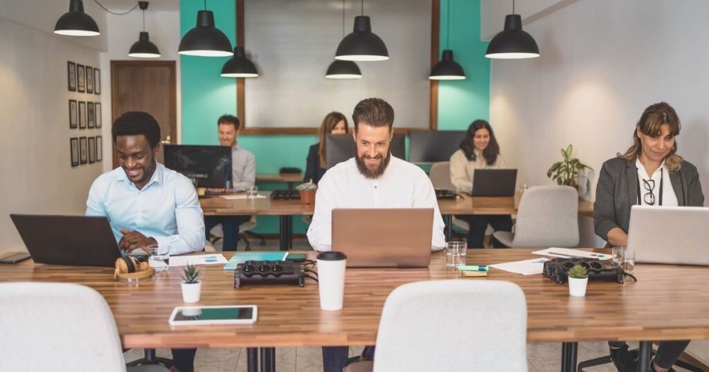 digital nomad people working from a coworking space