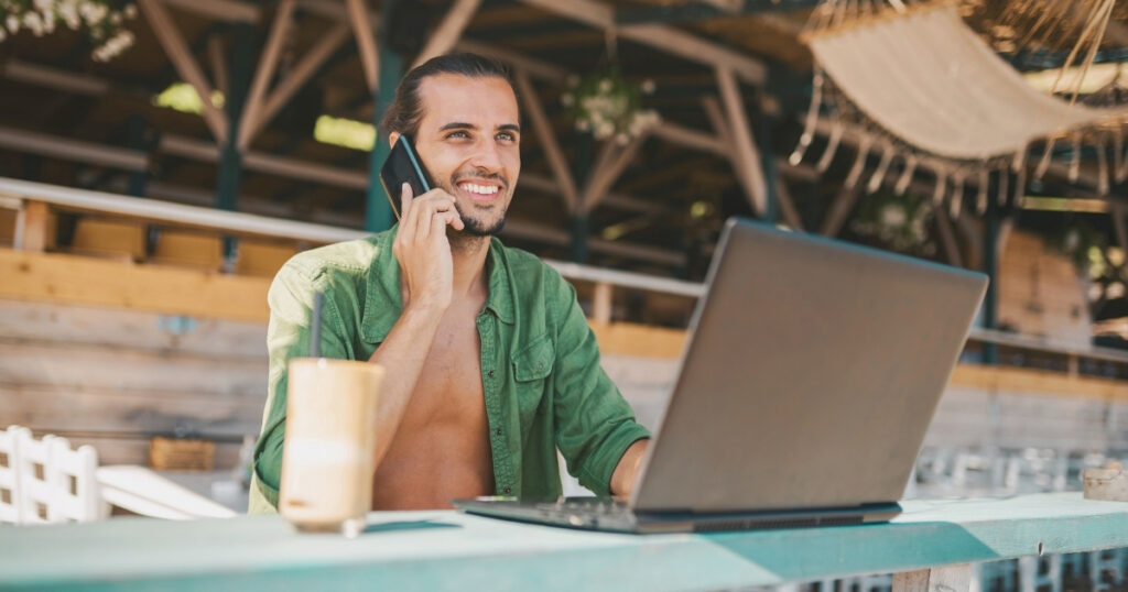 digital nomad man working in a laptop