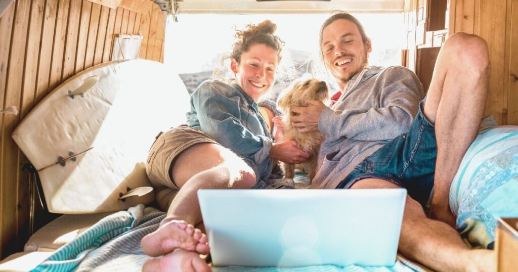 digital nomad couple traveling with a dog