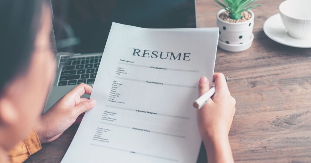 person sending a resume to get a job as a digital nomad