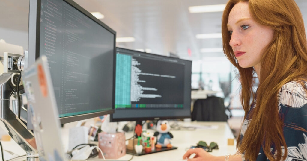 digital nomad woman coding