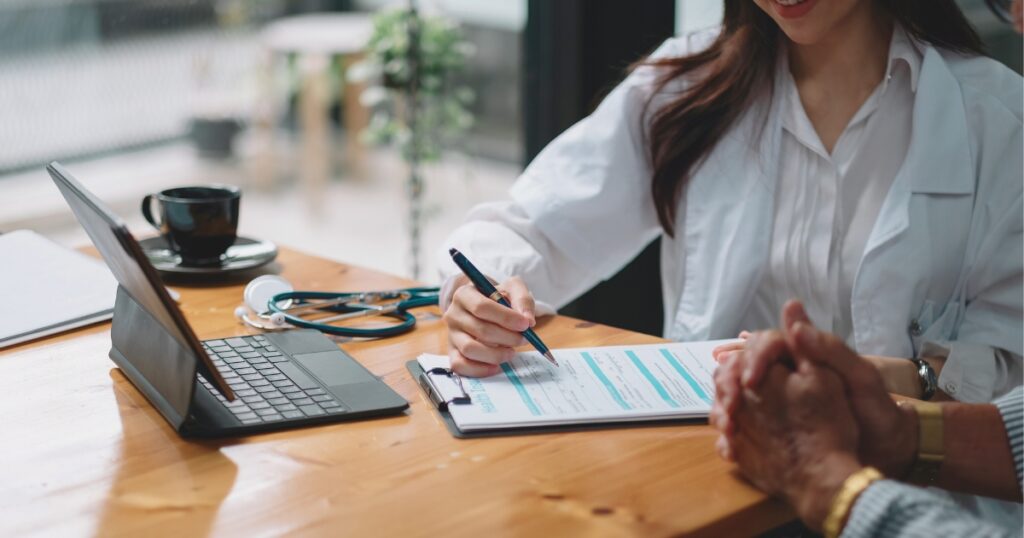 person calculating the costs of healthcare in Canada for digital nomads