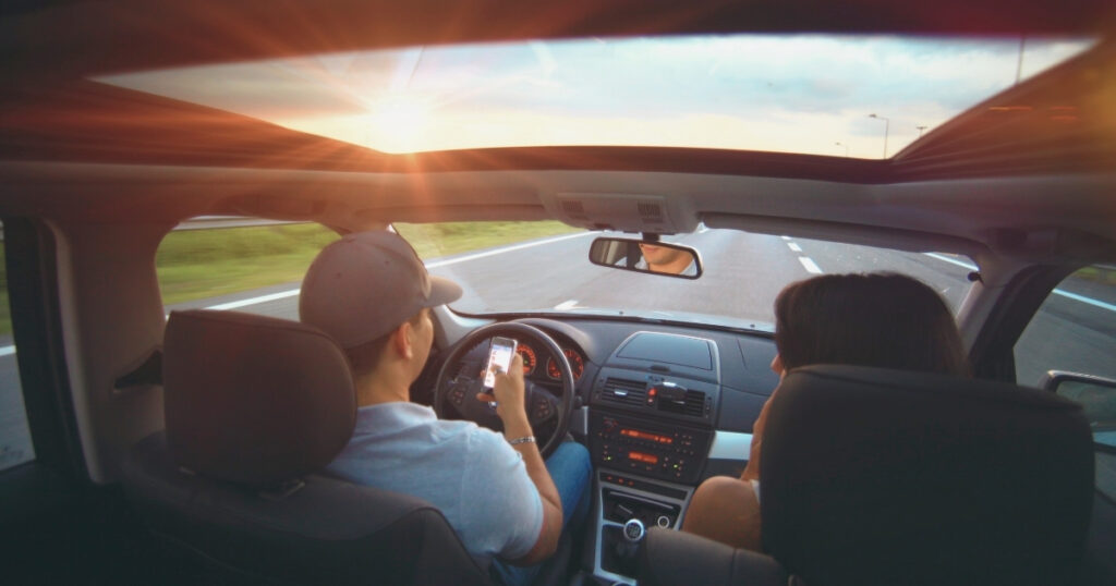 couple of friends driving in Italy