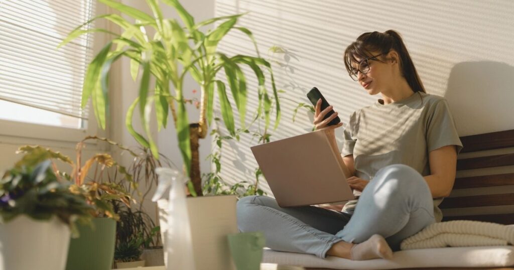 young woman working living in Brazil as a digital nomad while working remotely