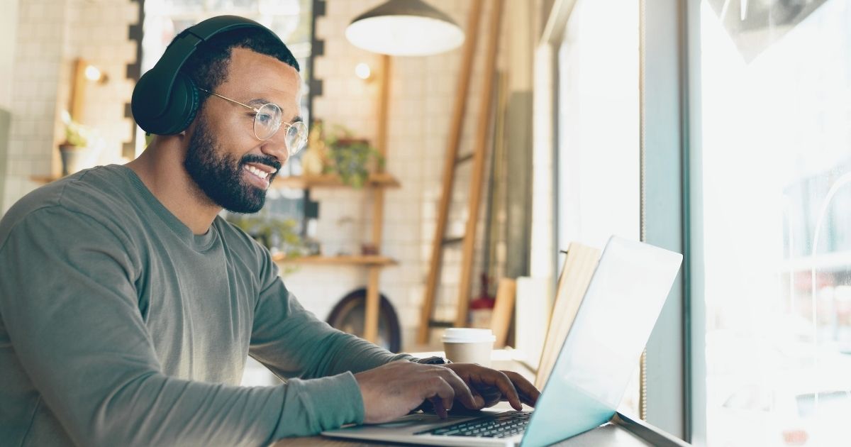 young man working remotely from Italy