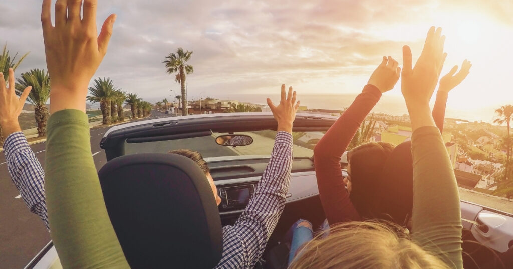 friends driving a car in a trip in Brazil