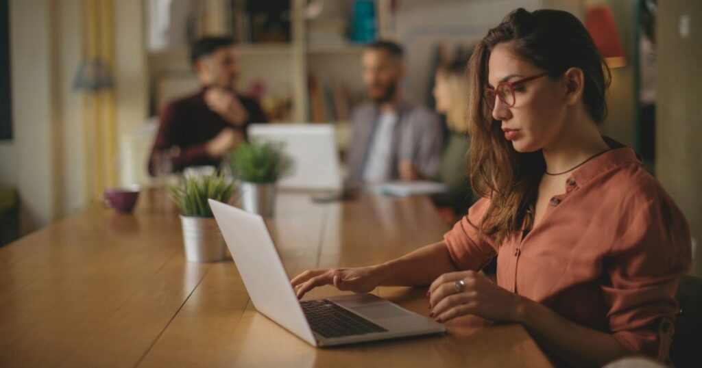 young woman working and living as a digital nomad in Canada