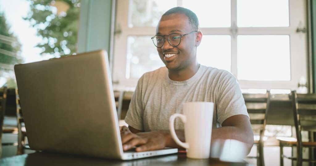 man working remotely and living in Italy as a digital nomad