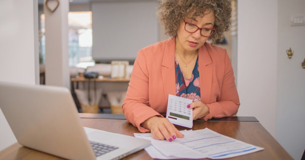 woman calculating income tax in Brazil