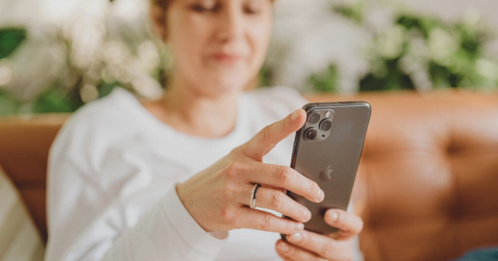 woman using internet with a prepaid sim card