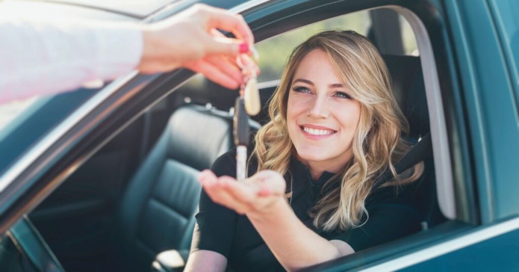 woman renting a car in Portugal