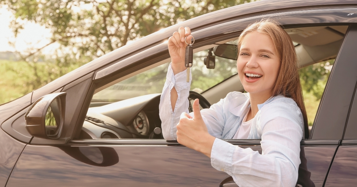 young woman getting the international driving licence in Germany