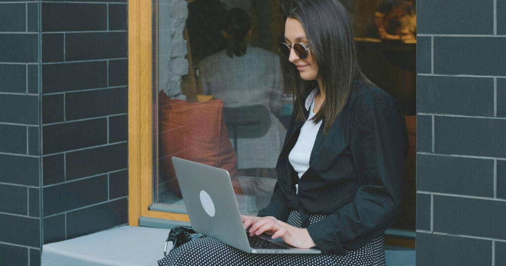 woman working with her laptop in Europe