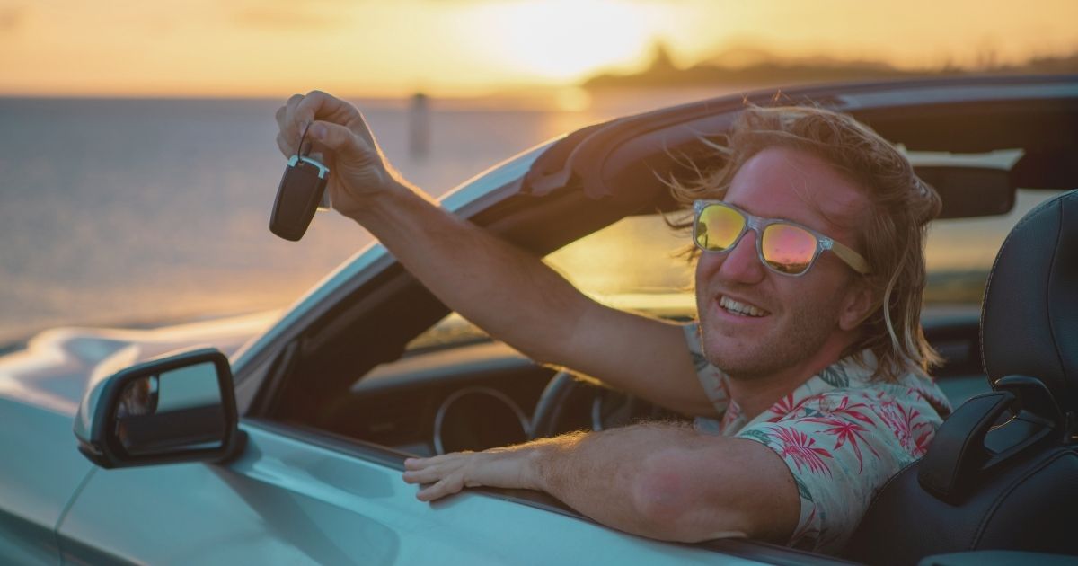man renting a car in Portugal