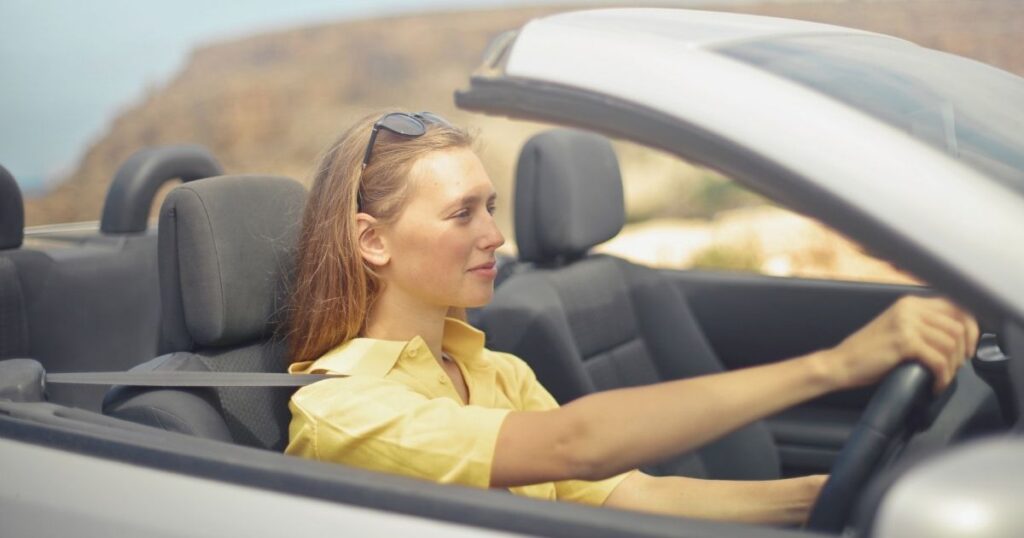 woman driving in different regions in the USA