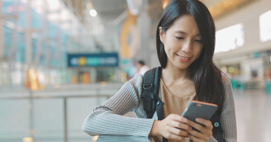woman navigating on internet across borders