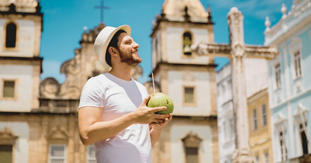 man enjoying his trip to Brazil through a travel insurance
