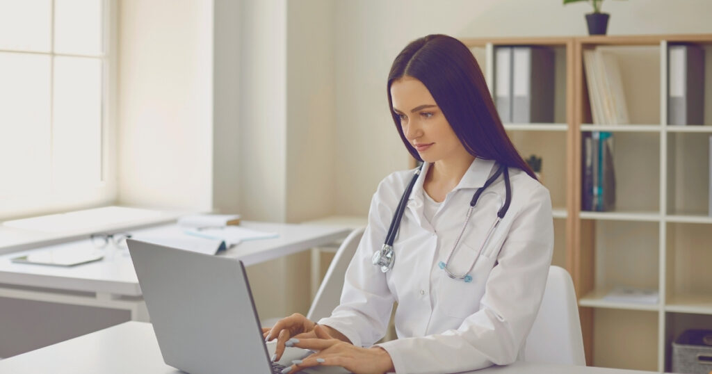 woman doctor attending online in the UK