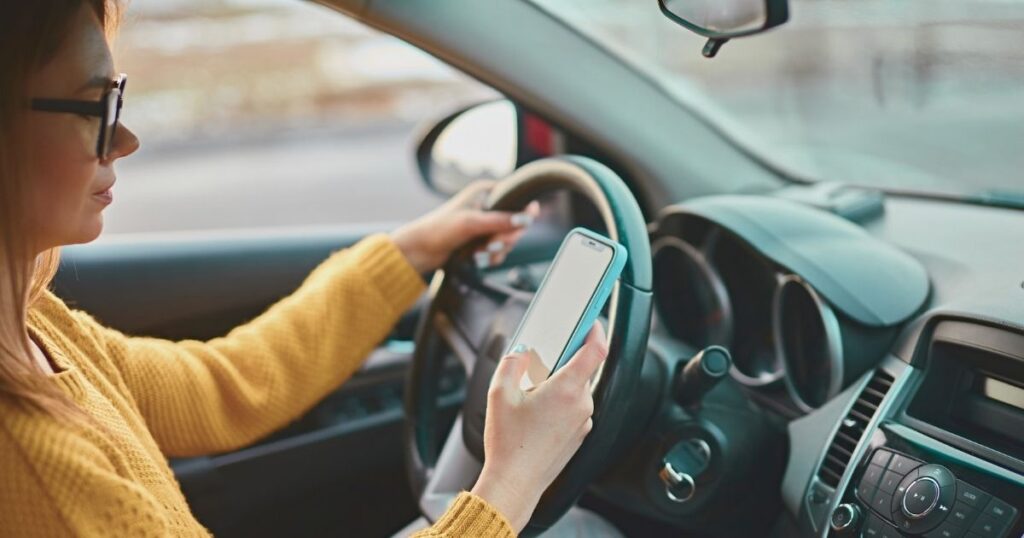 woman navigating on internet with an esim for cars