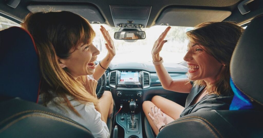 women enjoying a roadtrip with an esim for cars