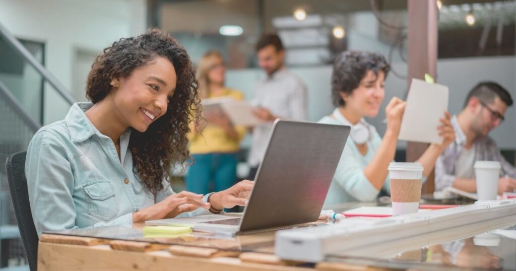 digital nomad woman working from a  budget-friendly coworking in Malaga