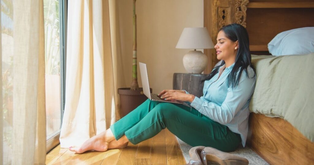 digital nomad woman working from Malaga boutique hotel