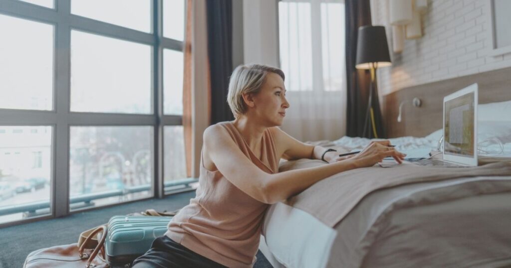 digital nomad woman working from a hotel in Barcelona