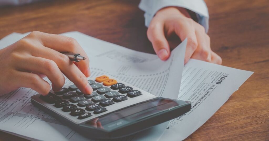 person calculating taxes in Spain