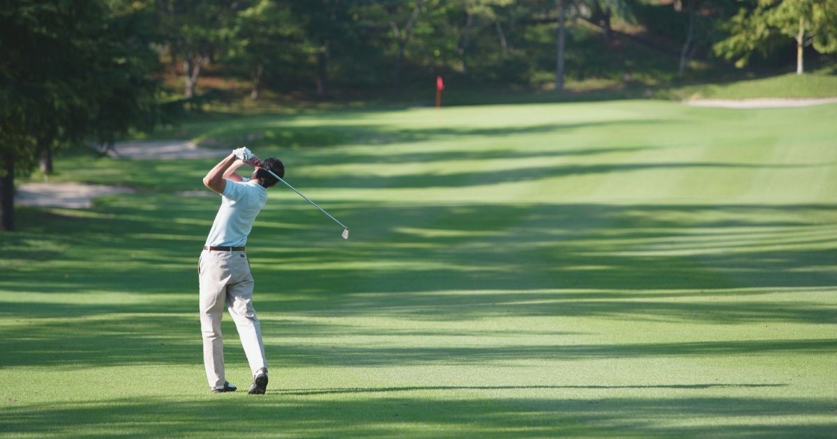 man playing golf in Malaga