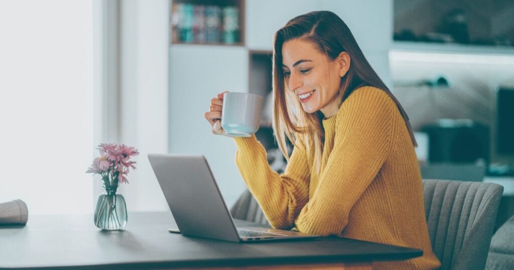 smiling woman working from Malaga