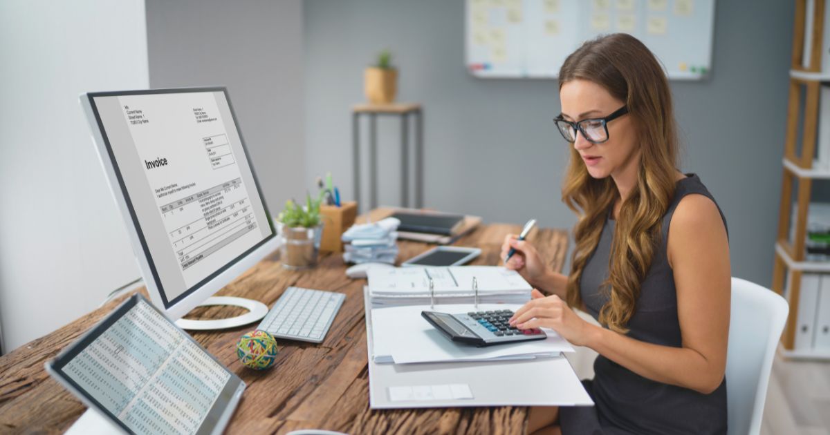 woman calculating taxes to pay in Spain
