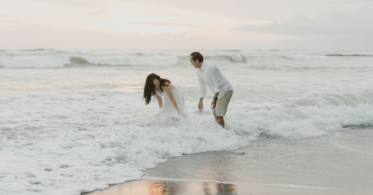 digital nomad couple enjoying their time in Malaga beach
