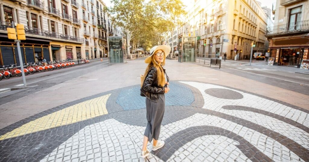 smiling woman exploring Barcelona
