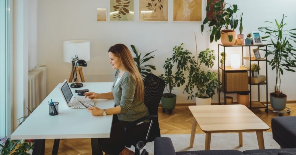 digital nomad woman working in a workspace in Malaga
