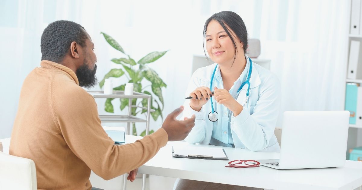 man in a doctor appointment through a health insurance in Brazil