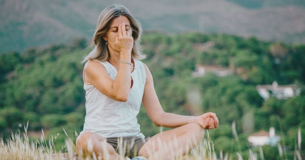 woman doing meditation in Bali