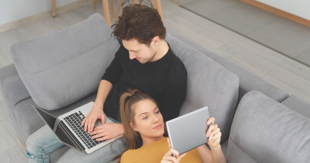 couple navigating on internet in Australia