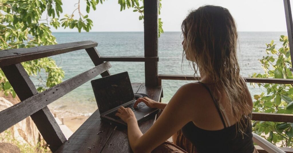 young woman working remotely from Bali
