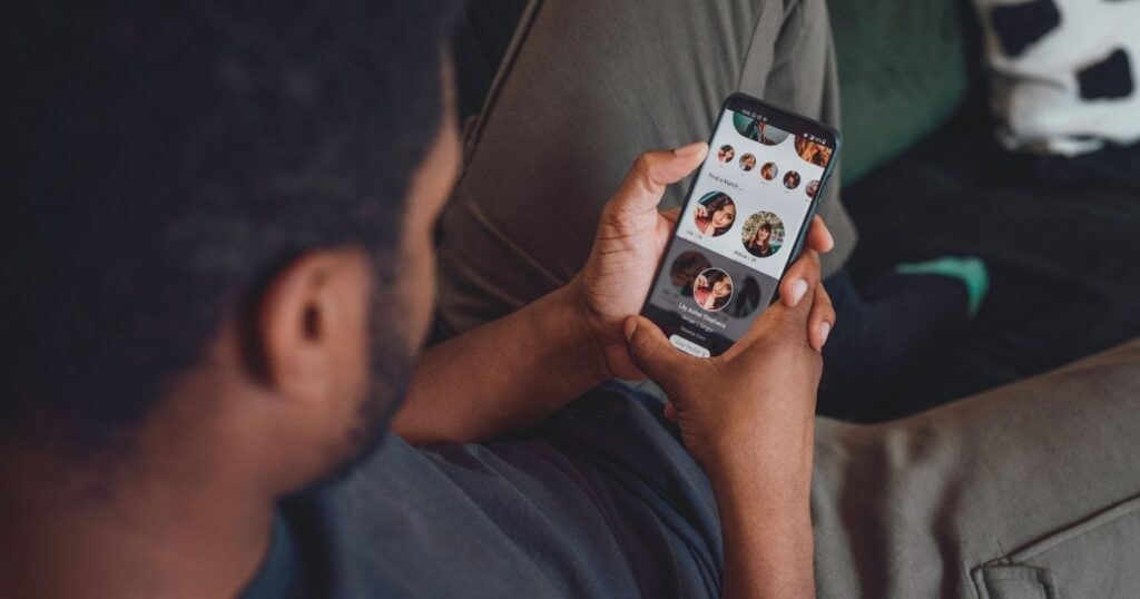 man optimizing his profile on a dating app