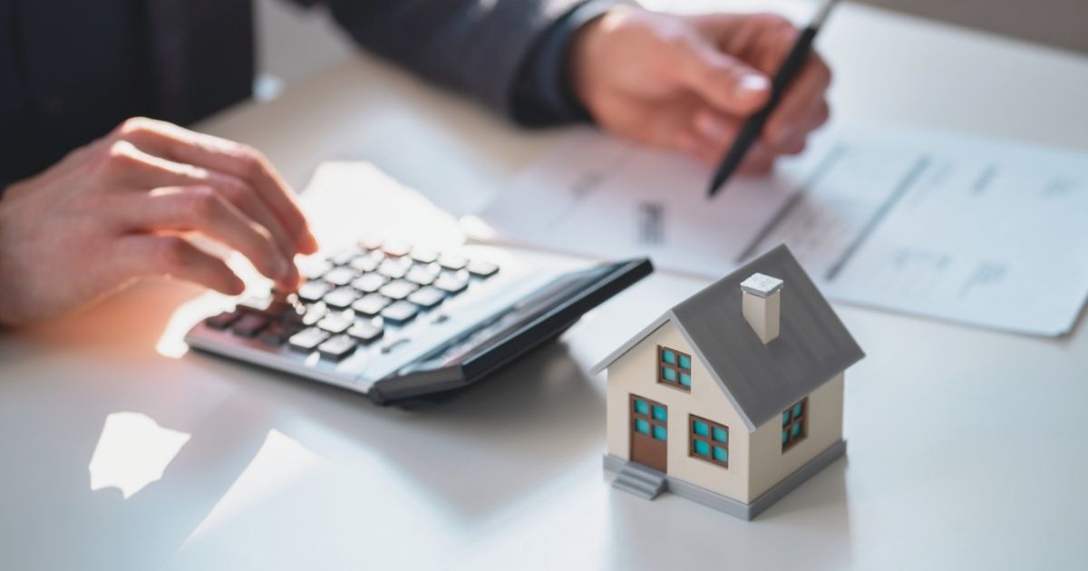 person paying the property taxes in Portugal