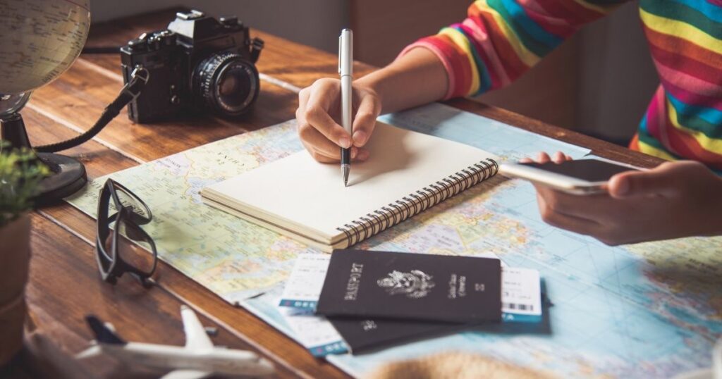 woman planning her budget to travel to Barcelona