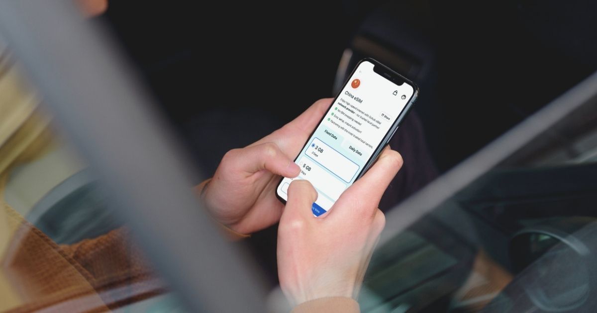 woman using esim in her cellphone in Barcelona