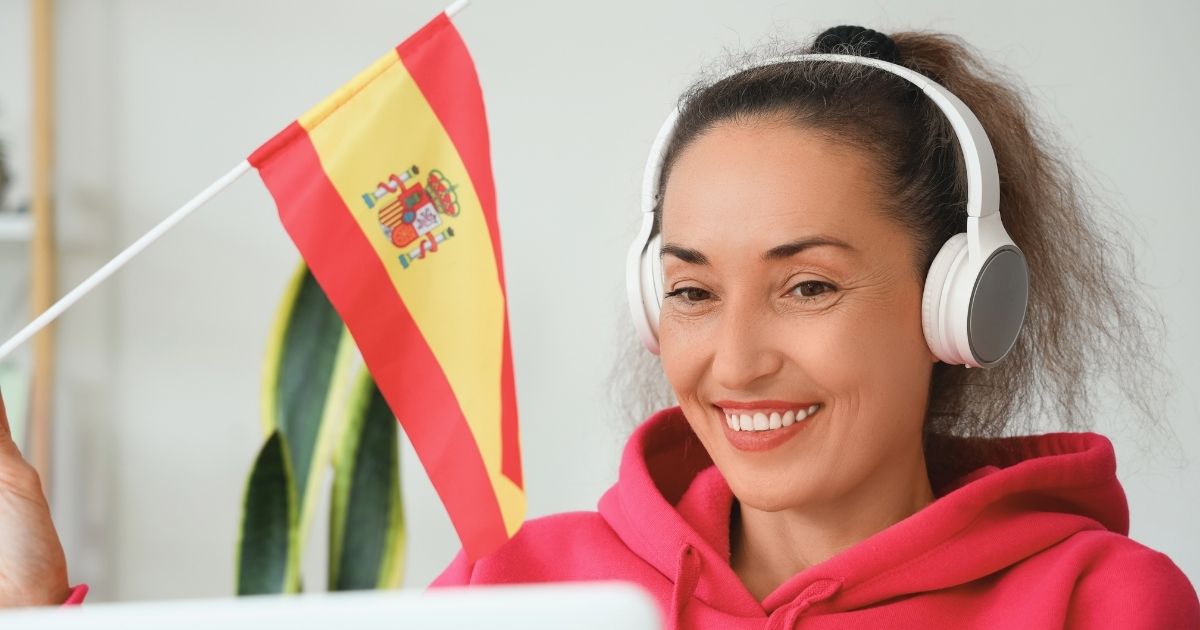 smiling woman taking an Spanish course in Barcelona