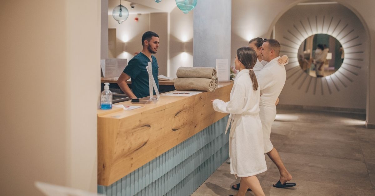 couple with a kid enjoying a relax time in a family hotel in Barcelona
