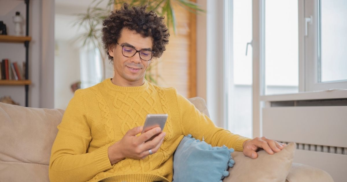 man using internet with esim in Sweden