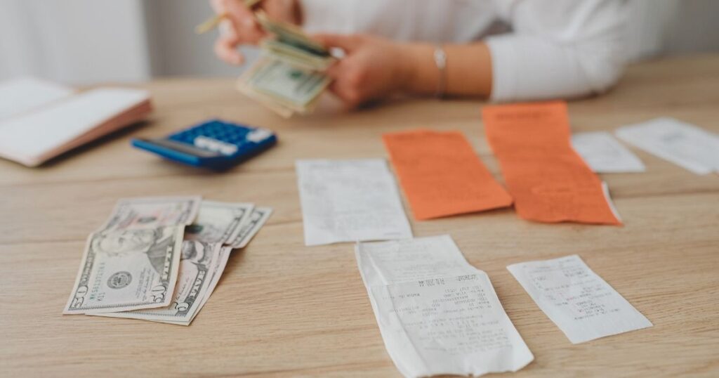 woman paying taxes in Finland