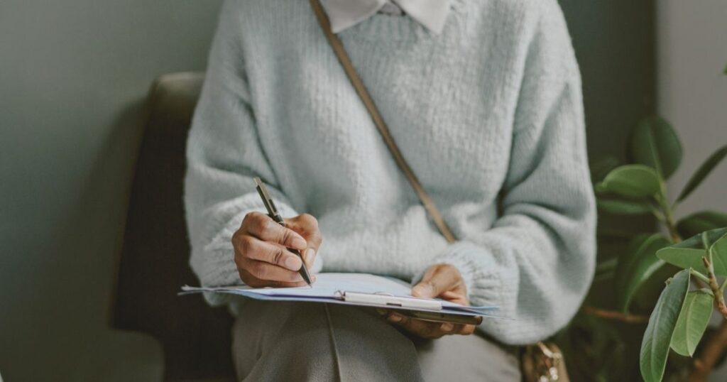 woman filling the application process for the tourist visa in Finland